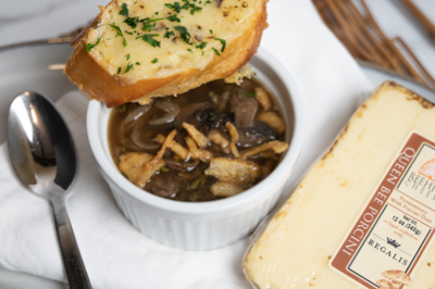 French onion soup topped with cheddar cheese toast