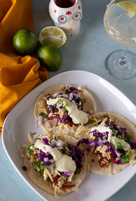 Mushroom street tacos with cabbage slaw and cheddar cheese